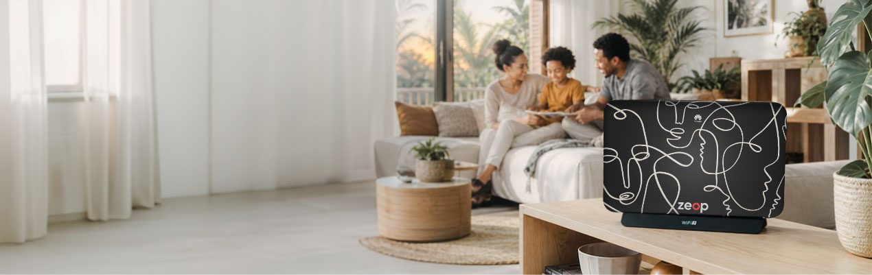 Famille r�unie dans son salon, avec la box Wi-Fi 7 zeop au premier plan